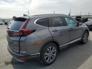 2022 Honda CR-V Touring z VIN 7FARW2H96NE052072, wystawiony jako Copart lot #52214465 z przebiegiem 63 832 mil mil oraz Szkoda całkowita • Salvage title. Historia ofert i sprzedaży dostępna na DreamBid. Obrazek 3.