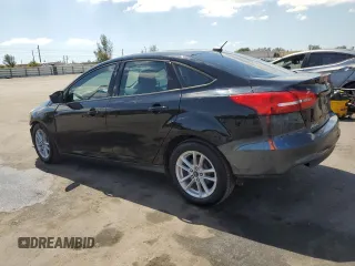 2017 Ford Focus SE with VIN 1FADP3F26HL221366, listed as a Copart auction lot 53295835 with 100,398 mi miles and Salvage Title. Bid and sale history available at carsss.com. Image 2.
