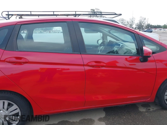 2015 Honda Fit LX with VIN 3HGGK5H52FM762596, listed as a IAAI auction lot 42129871 with 62,323 mi miles and . Bid and sale history available at DreamBid. Image 14.