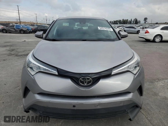 2018 Toyota C-HR XLE z VIN NMTKHMBX3JR023403, wystawiony jako Copart lot #54574245 z przebiegiem 119 657 mil mil oraz Szkoda całkowita • Salvage title. Historia ofert i sprzedaży dostępna na DreamBid. Obrazek 5.