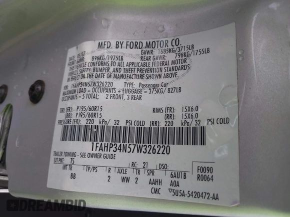 2007 Ford Focus S z VIN 1FAHP34N57W326220, wystawiony jako IAAI lot #42123072 z przebiegiem Nie podano mil oraz . Historia ofert i sprzedaży dostępna na DreamBid. Obrazek 9.