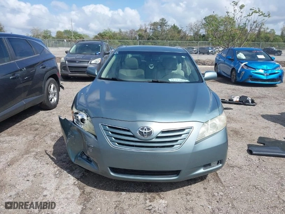 2009 Toyota Camry with VIN 4T1BE46KX9U887960, listed as a IAAI auction lot 41727053 with 130,300 mi miles. Bid and sale history available at carsss.com. Image 12.