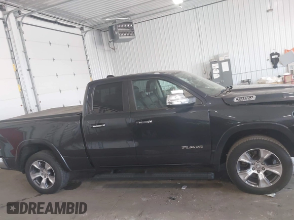 2020 Ram 1500 Laramie with VIN 1C6SRFDT7LN142009, listed as a IAAI auction lot 42330341 with 108,351 mi miles and . Bid and sale history available at DreamBid. Image 13.