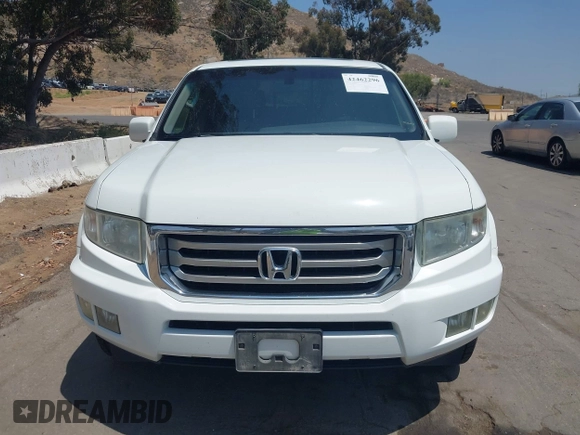 2012 Honda Ridgeline RTL z VIN 5FPYK1F57CB455267, wystawiony jako IAAI lot #42462296 z przebiegiem 186 451 mil mil oraz . Historia ofert i sprzedaży dostępna na DreamBid. Obrazek 12.