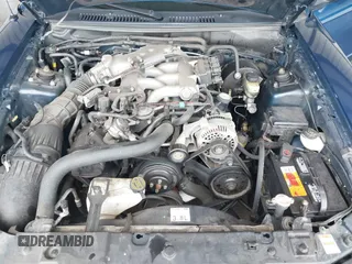 1999 Ford Mustang with VIN 1FAFP4040XF124637, listed as a IAAI auction lot 41793662 with 54,591 mi miles and . Bid and sale history available at DreamBid. Image 10.