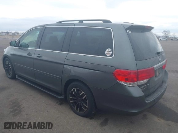 2008 Honda Odyssey Touring with VIN 5FNRL38888B018625, listed as a IAAI auction lot 41383235 with 215,255 mi miles. Bid and sale history available at carsss.com. Image 3.