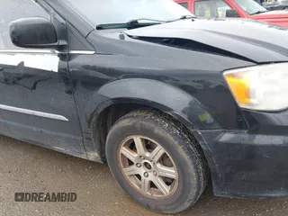 2012 Chrysler Town & Country Touring z VIN 2C4RC1BG7CR308730, wystawiony jako IAAI lot #41868726 z przebiegiem 250 606 mil mil oraz . Historia ofert i sprzedaży dostępna na DreamBid. Obrazek 13.