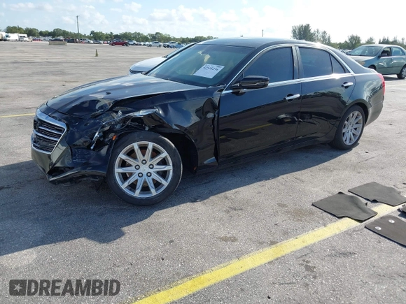 2015 Cadillac CTS RWD with VIN 1G6AP5SX8F0140364, listed as a IAAI auction lot 42535236 with 126,277 mi miles and . Bid and sale history available at DreamBid. Image 2.