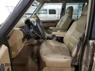2000 Land Rover Discovery Cloth with VIN SALTY1248YA271415, listed as a Copart auction lot 80648734 with 165,521 mi miles and Salvage Title. Bid and sale history available at DreamBid. Image 7.