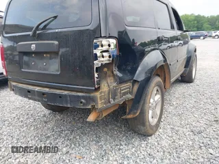 2007 Dodge Nitro SXT z VIN 1D8GU28K97W727361, wystawiony jako IAAI lot #42142970 z przebiegiem 144 579 mil mil oraz . Historia ofert i sprzedaży dostępna na DreamBid. Obrazek 13.