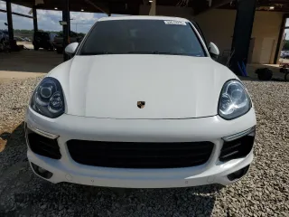 2016 Porsche Cayenne z VIN WP1AA2A26GLA09807, wystawiony jako Copart lot #59619335 z przebiegiem 102 327 mil mil oraz Szkoda całkowita • Salvage title. Historia ofert i sprzedaży dostępna na DreamBid. Obrazek 5.