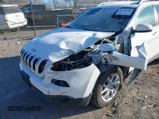 2018 Jeep Cherokee Latitude with VIN 1C4PJMCX8JD548480, listed as a IAAI auction lot 41378186 with 52,051 mi miles and . Bid and sale history available at DreamBid. Image 6.