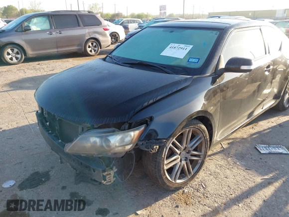 2013 Scion tC with VIN JTKJF5C77D3050609, listed as a IAAI auction lot 41872911 with 197,531 mi miles. Bid and sale history available at carsss.com. Image 6.