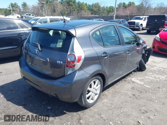 2014 Toyota Prius One z VIN JTDKDTB32E1070932, wystawiony jako IAAI lot #41950966 z przebiegiem 93 952 mil mil oraz . Historia ofert i sprzedaży dostępna na DreamBid. Obrazek 4.