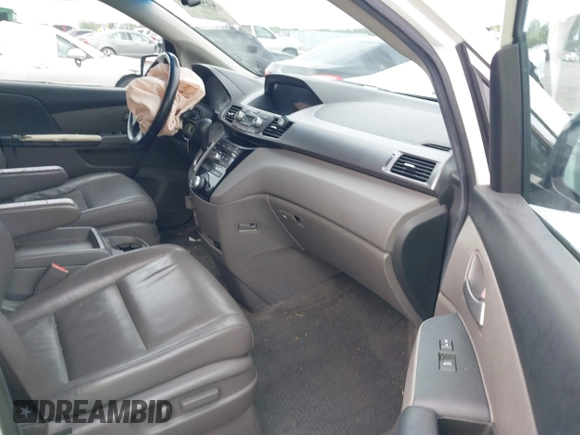 2012 Honda Odyssey EX-L with VIN 5FNRL5H60CB134954, listed as a IAAI auction lot 41942488 with 192,069 mi miles and . Bid and sale history available at DreamBid. Image 5.