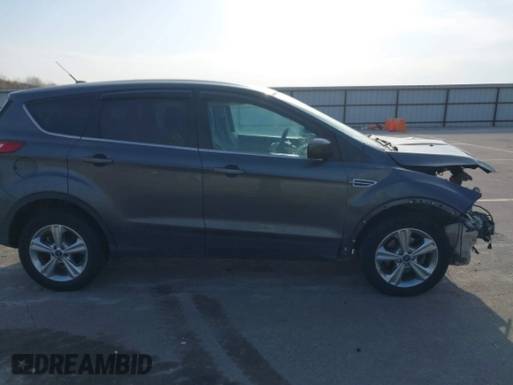 2015 Ford Escape SE with VIN 1FMCU0G73FUA77673, listed as a IAAI auction lot 41988290 with 176,734 mi miles. Bid and sale history available at carsss.com. Image 13.