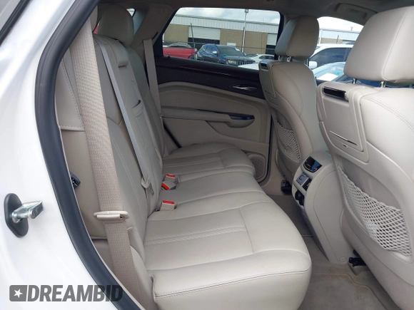 2015 Cadillac SRX Premium Collection with VIN 3GYFNDE37FS627697, listed as a IAAI auction lot 42354811 with 64,135 mi miles and . Bid and sale history available at DreamBid. Image 8.