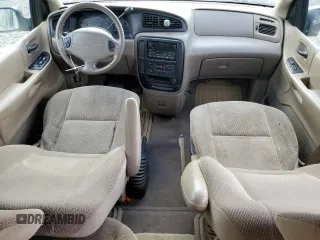 2000 Ford Windstar SE с VIN 2FMZA5249YBC34841, выставлен на аукционе Copart как лот 72383304 с пробегом Не указан миль и Списание • Salvage title. История ставок и продаж доступна на DreamBid. Изображение 8.