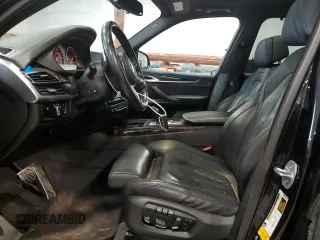 2016 BMW X5 xDrive50i z VIN 5UXKR6C58G0J83648, wystawiony jako Copart lot #58219015 z przebiegiem 96 254 mil mil oraz Szkoda całkowita • Salvage title. Historia ofert i sprzedaży dostępna na DreamBid. Obrazek 7.