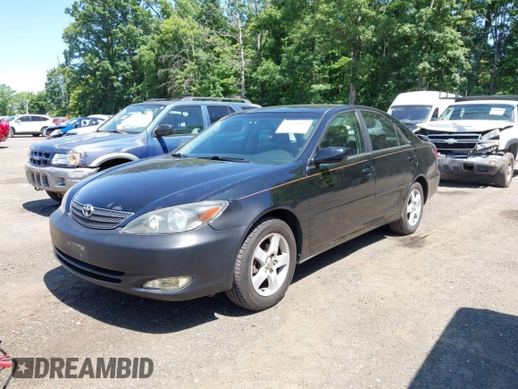 2002 Toyota Camry LE z VIN JTDBE32K020095947, wystawiony jako IAAI lot #42364984 z przebiegiem 198 756 mil mil oraz . Historia ofert i sprzedaży dostępna na DreamBid. Obrazek 2.