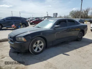2012 Dodge Charger SE with VIN 2C3CDXBG5CH178656, listed as a Copart auction lot 49979995 with 117,505 mi miles and Salvage Title. Bid and sale history available at DreamBid. Image 1.