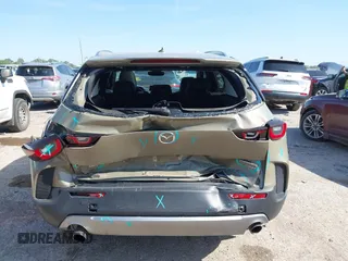 2024 Mazda CX-50 Premium z VIN 7MMVABDYXRN229669, wystawiony jako IAAI lot #41999385 z przebiegiem 10 882 mil mil oraz . Historia ofert i sprzedaży dostępna na DreamBid. Obrazek 16.