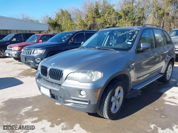2007 BMW X5 3.0si with VIN 5UXFE43577L014625, listed as a IAAI auction lot 41325492 with 200,769 mi miles. Bid and sale history available at carsss.com. Image 2.