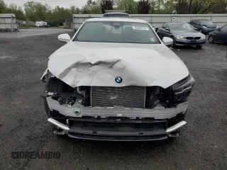 2024 BMW 5 Series 530i xDrive with VIN WBA53FJ01RCP97253, listed as a Copart auction lot 50888795 with 11,985 mi miles and Salvage title. Bid and sale history available at DreamBid. Image 5.