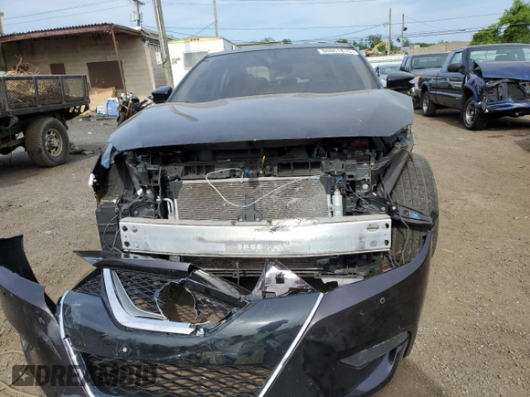 2016 Nissan Maxima SR with VIN 1N4AA6AP9GC447540, listed as a Copart auction lot 60861815 with 127,420 mi miles and Salvage title. Bid and sale history available at DreamBid. Image 5.