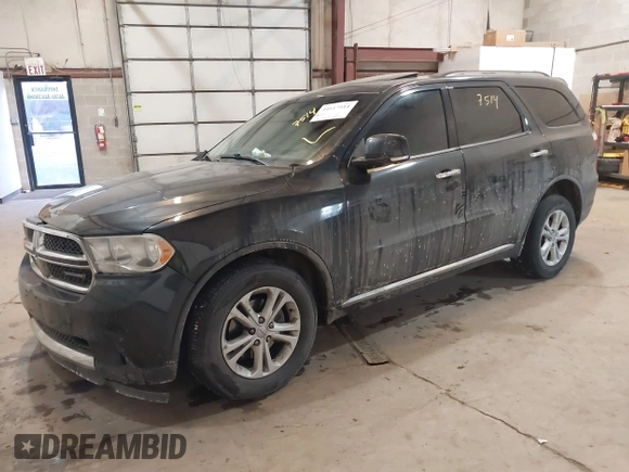 2013 Dodge Durango Crew z VIN 1C4RDJDG7DC661411, wystawiony jako IAAI lot #41617514 z przebiegiem 145 309 mil mil oraz . Historia ofert i sprzedaży dostępna na DreamBid. Obrazek 17.