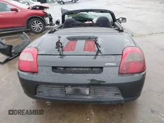 2002 Toyota MR2 z VIN JTDFR320720045244, wystawiony jako IAAI lot #40486938 z przebiegiem 61 802 mil mil oraz . Historia ofert i sprzedaży dostępna na DreamBid. Obrazek 17.