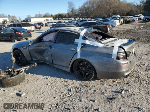 2014 BMW M5 z VIN WBSFV9C57ED593159, wystawiony jako Copart lot #87475634 z przebiegiem Nie podano mil oraz Szkody całkowita. Historia ofert i sprzedaży dostępna na DreamBid. Obrazek 2.