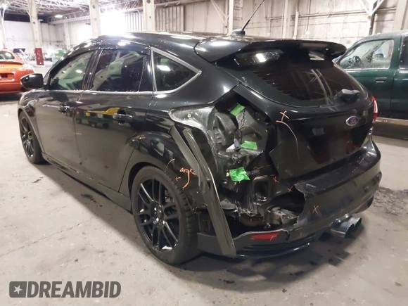 2014 Ford Focus ST with VIN 1FADP3L96EL355713, listed as a IAAI auction lot 41572939 with 102,838 mi miles and . Bid and sale history available at carsss.com. Image 3.