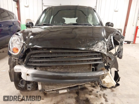 2012 MINI Countryman with VIN WMWZB3C53CWM05133, listed as a IAAI auction lot 41493309 with 114,412 mi miles and . Bid and sale history available at DreamBid. Image 6.