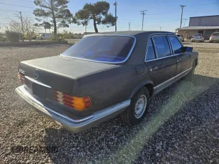 1985 Mercedes-Benz 500 with VIN WDBCA37D3FA170312, listed as a Copart auction lot 84864774 with 132,617 mi miles and Clean Title. Bid and sale history available at carsss.com. Image 4.