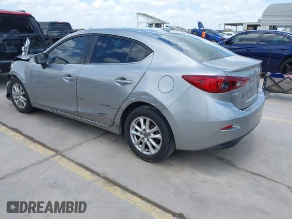 2015 Mazda 3 i Touring z VIN 3MZBM1V73FM144587, wystawiony jako IAAI lot #42422701 z przebiegiem 130 483 mil mil oraz . Historia ofert i sprzedaży dostępna na DreamBid. Obrazek 3.