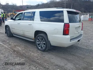 2015 Chevrolet Suburban LTZ with VIN 1GNSKKKC4FR304532, listed as a IAAI auction lot 41899860 with 123,624 mi miles. Bid and sale history available at carsss.com. Image 3.