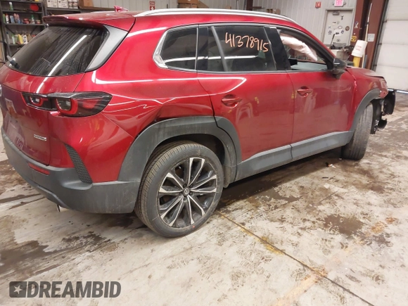2023 Mazda CX-50 S Premium Plus with VIN 7MMVABEM8PN105411, listed as a IAAI auction lot 41378915 with 34,866 mi miles and . Bid and sale history available at DreamBid. Image 4.