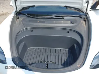 2021 Tesla Model 3 Standard Range Plus z VIN 5YJ3E1EA9MF027985, wystawiony jako IAAI lot #42045254 z przebiegiem 42 353 mil mil oraz . Historia ofert i sprzedaży dostępna na DreamBid. Obrazek 10.