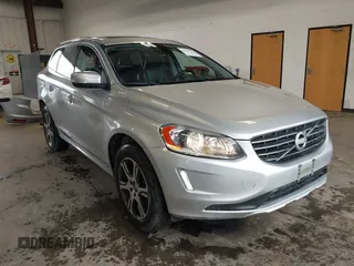 2014 Volvo XC60 R-Design Premier Plus with VIN YV4902DZ1E2555687, listed as a IAAI auction lot 41855015 with 83,297 mi miles and . Bid and sale history available at DreamBid. Image 1.
