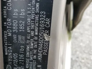 2005 Hyundai Elantra GLS z VIN KMHDN46D05U169323, wystawiony jako Copart lot #55138445 z przebiegiem 142 454 mil mil oraz Czysty tytuł • Clean title. Historia ofert i sprzedaży dostępna na DreamBid. Obrazek 12.