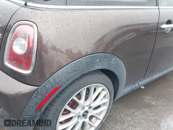 2010 MINI Hardtop S with VIN WMWMF7C50ATZ74395, listed as a IAAI auction lot 42227483 with 109,704 mi miles and . Bid and sale history available at DreamBid. Image 13.