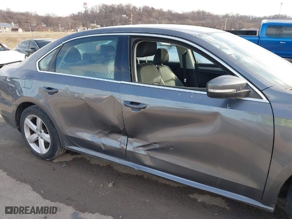2014 Volkswagen Passat SE w/Sunroof with VIN 1VWBT7A34EC118525, listed as a IAAI auction lot 41653118 with 124,832 mi miles. Bid and sale history available at carsss.com. Image 6.