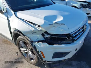 2018 Volkswagen Tiguan SEL Premium with VIN 3VV5B7AX2JM202908, listed as a IAAI auction lot 41137619 with 84,323 mi miles and . Bid and sale history available at DreamBid. Image 6.