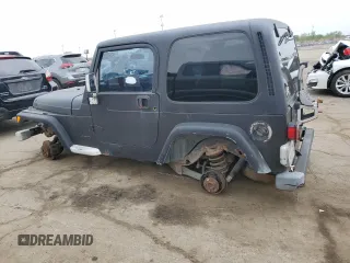 2002 Jeep Wrangler Sport z VIN 1J4FA49S22P763189, wystawiony jako Copart lot #57650295 z przebiegiem 197 383 mil mil oraz Czysty tytuł • Clean title. Historia ofert i sprzedaży dostępna na DreamBid. Obrazek 2.