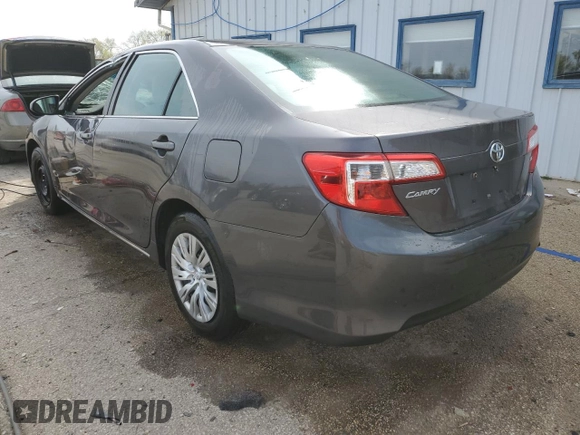 2014 Toyota Camry L with VIN 4T1BF1FK0EU424019, listed as a Copart auction lot 53088585 with 185,010 mi miles and Salvage Title. Bid and sale history available at DreamBid. Image 2.