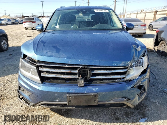 2020 Volkswagen Tiguan SE z VIN 3VV3B7AXXLM150387, wystawiony jako Copart lot #50516415 z przebiegiem 31 419 mil mil oraz Szkody całkowita. Historia ofert i sprzedaży dostępna na DreamBid. Obrazek 5.