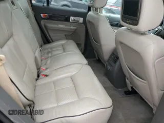 2009 Lincoln MKX z VIN 2LMDU88C89BJ12236, wystawiony jako Copart lot #53027675 z przebiegiem Nie podano mil oraz Szkoda całkowita • Salvage title. Historia ofert i sprzedaży dostępna na DreamBid. Obrazek 11.