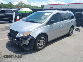 2012 Honda Odyssey EX-L with VIN 5FNRL5H65CB076534, listed as a IAAI auction lot 42440258 with 150,866 mi miles and . Bid and sale history available at DreamBid. Image 18.