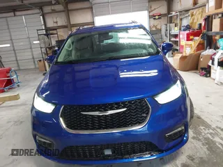 2021 Chrysler Pacifica Touring L z VIN 2C4RC1BGXMR503108, wystawiony jako IAAI lot #41914136 z przebiegiem 98 685 mil mil oraz . Historia ofert i sprzedaży dostępna na DreamBid. Obrazek 12.